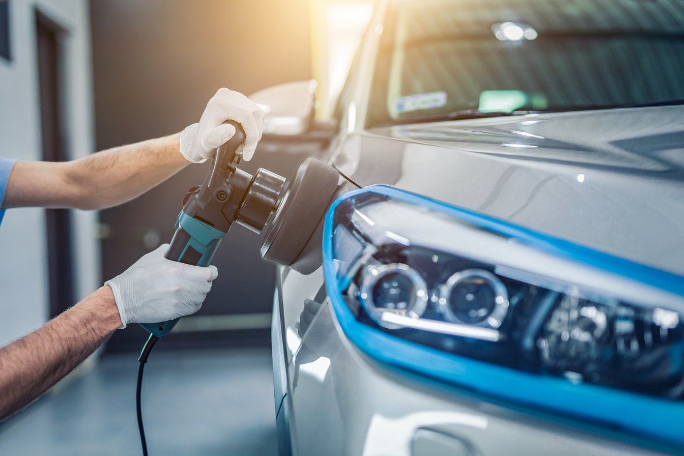 Person Polishing A Car